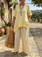 Women's Yellow Asymmetrical Top and Striped Pants Set